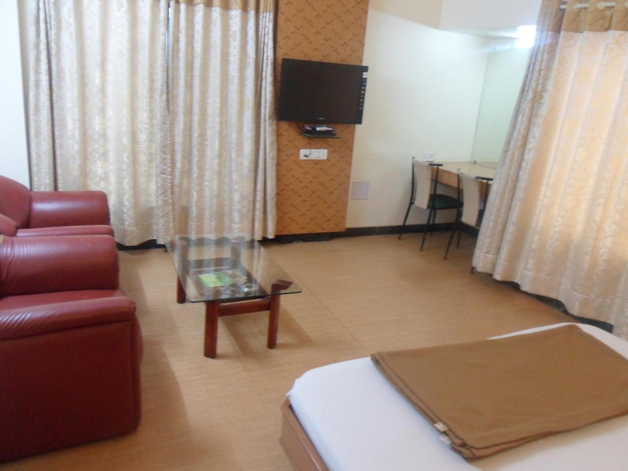 נאסיק Hotel Pooja International חדר תמונה